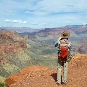 hiker Grand Canyon in March trek backpack guided overlook